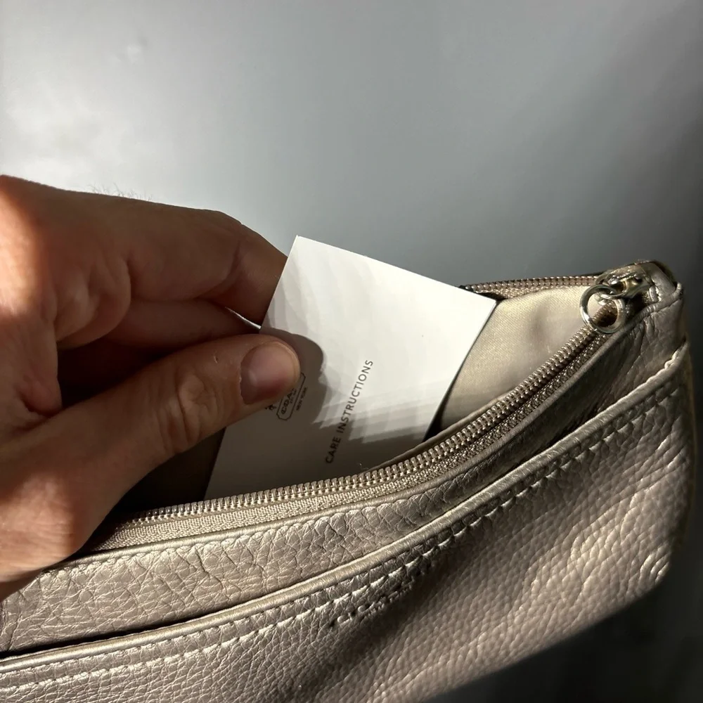 Coach Silver Pebbled Leather Zip Wristlet
